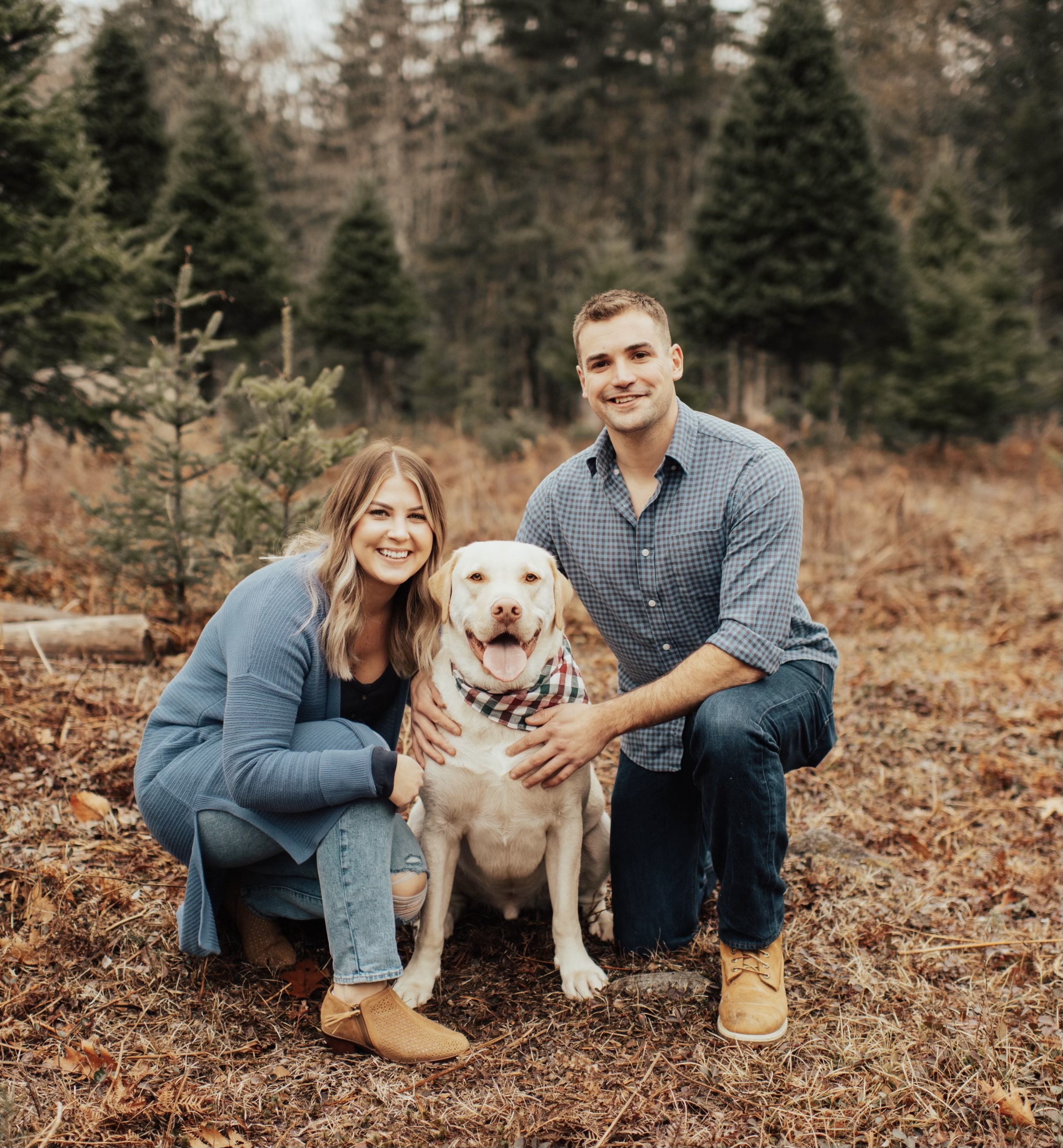 Family photo of Dylan and Brittany Foster and their dog